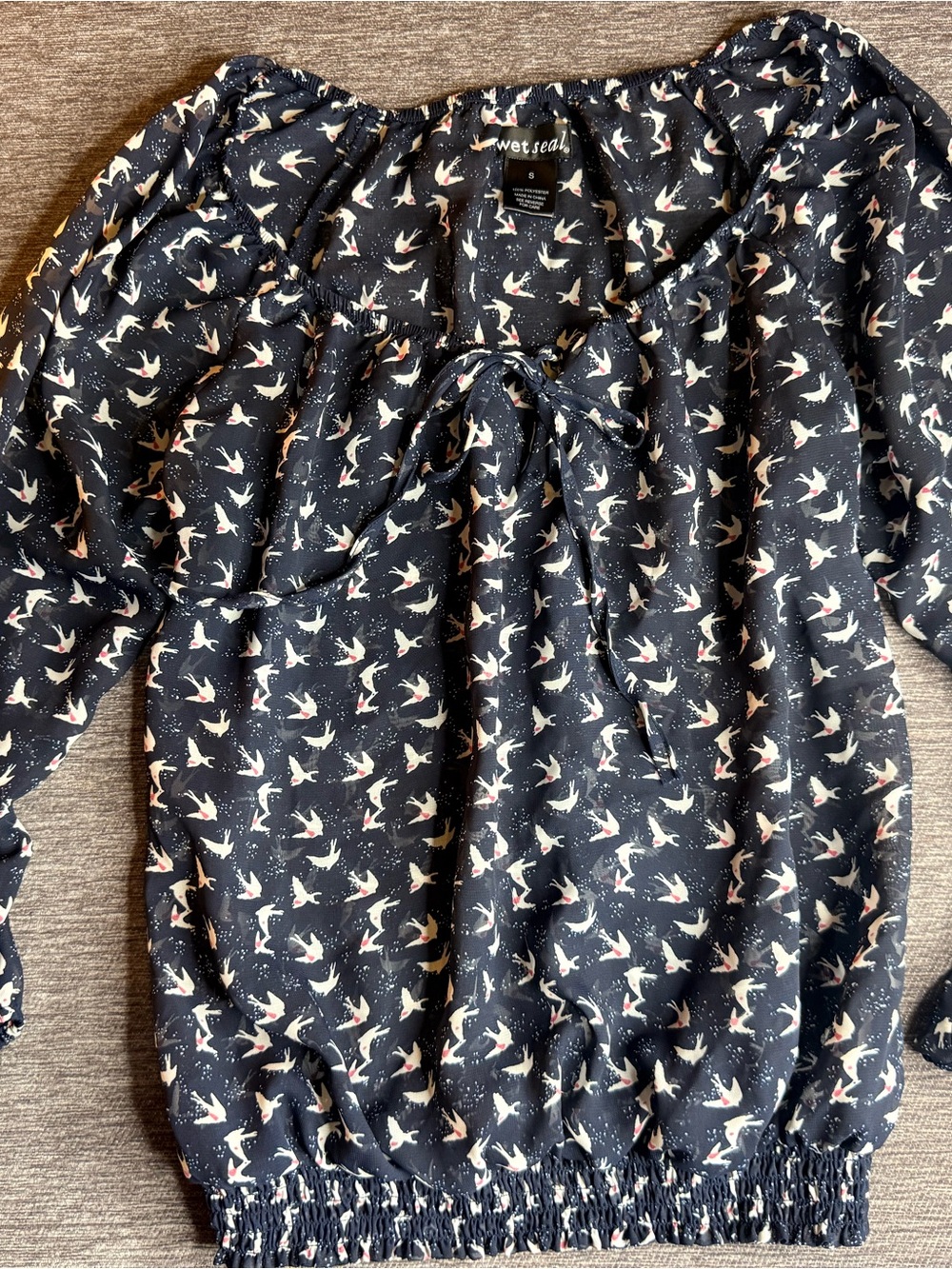 Whimsical bird-print blouse